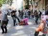 greek police beating african woman