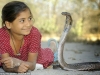 indian girl with her pet cobra