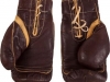 Auction Prices Realized Muhammad Ali's Gloves Worn vs. Sonny Liston (1st fight) Sell for a record $837,000.00.