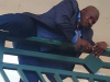 nigerian mp jumping  a fence2